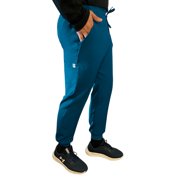 CONJUNTO HOMBRE JOGGER ANTIFLUIDO VERDE PETROLEO MODELO ESPARTA